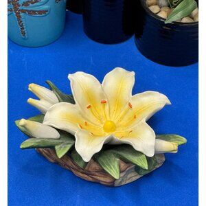 Porcelain Decorative Lily Figurine On Driftwood Base